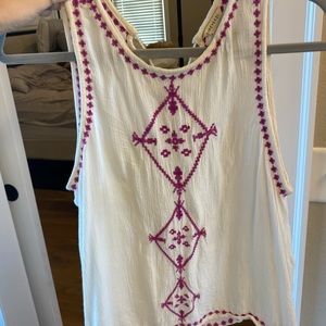 Tank with ties in back